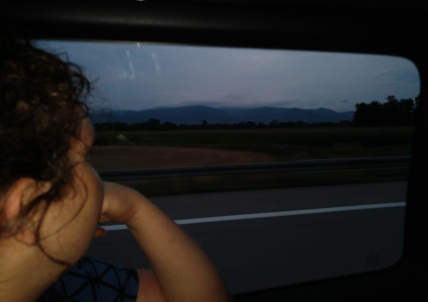 Me looking out the window of the car